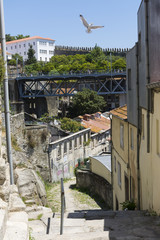 Narrow street, Luiz I bridge and fortified wall