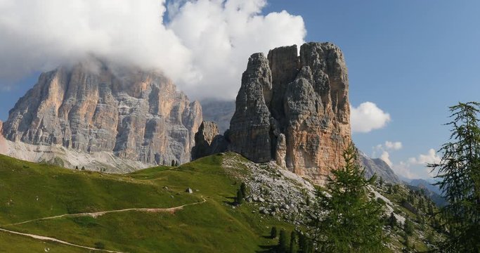Dolomites, Cinque Torri and Tofana de Rozes. Cinque Torri, Cortina d'Ampezzo. In the foreground the dolomite rock formation of the Torre Grande, the largest of the five towers.