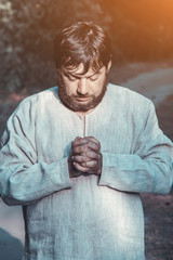 a man praying to God for the remission of sins