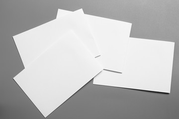 Blank portrait mock-up paper. brochure magazine isolated on gray, changeable background / white paper isolated on gray