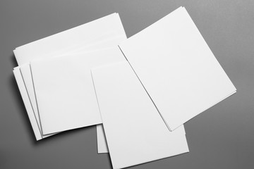 Blank portrait mock-up paper. brochure magazine isolated on gray, changeable background / white paper isolated on gray