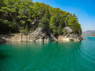 Fototapeta na wymiar Turquoise lake and mountains. Turkish Green Canyon 