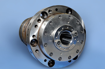 Steel parts for industrial machinery round shape. Blue toning