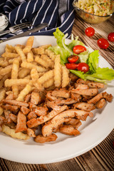 Greek gyros dis with fries and salad