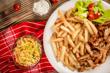 Greek gyros dis with fries and salad