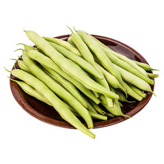 Fresh green beans in a clay plate on a table, white isolated background