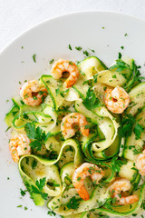parboiled zucchini noodles with fired seafood, garlic oil, lemon juice, and parsley 