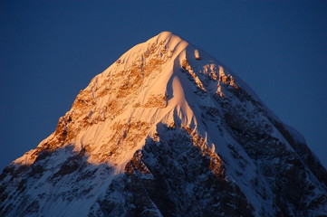 Close up of the peak of Mount Pumori in the Himalayas in Nepal at sunset