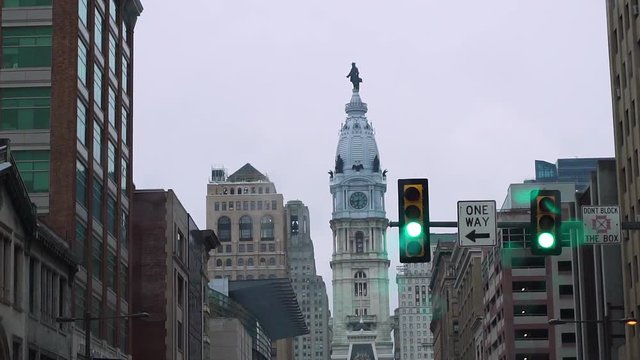 View of City Hall in Philadelphia on a stormy day, rack focus to water drops on windshield√Ç