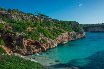 Fototapeta na wymiar Spain Mediterranean Sea, Majorca beach of Cala Moro beautiful seaside bay, Balearic Islands.