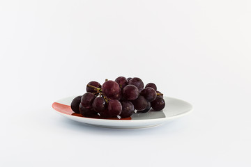Red Grapes on White Dish