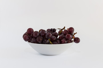 Red Grapes on White Bowl