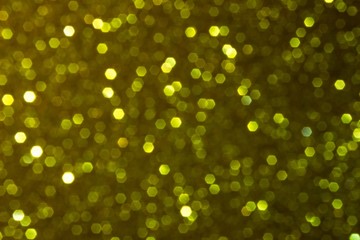 Golden sparkle blur abstract background. bokeh christmas blurred beautiful shiny Christmas lights