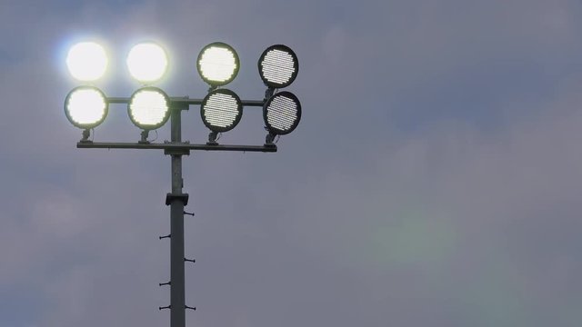 LED stadium lights on a football field