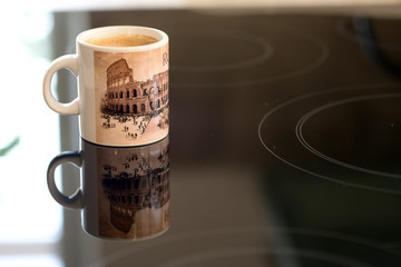 Reflected cup of coffee