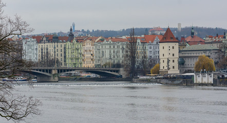 View of the left bank of Prague, Smichov, Malostransky district and the ancient water tower. Architectural monument of Prague. Czech Republic.