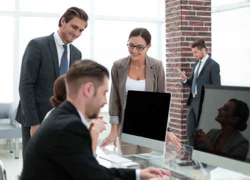 Bank employees sitting at the Desk