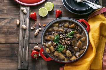 Beef and potato stew in pot, asian cuisine, copy space