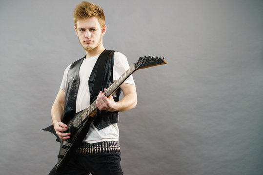 Man playing on electric guitar