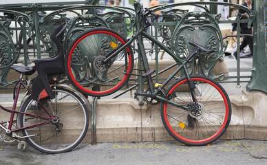 Red bicycle parked in the street