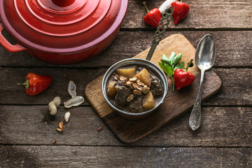 Thai Muslim beef curry or massaman curry served in copper pan