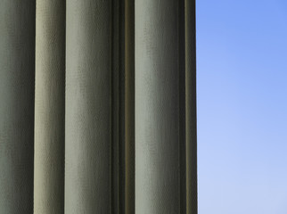 Window shades and blue sky