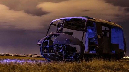 Great time lapse shots through a junkyard or boneyard of abandoned airplanes at night.