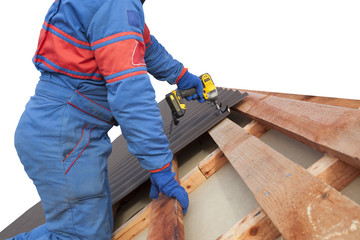 Man worker uses a power drill