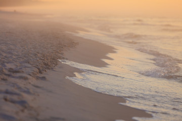 Fototapeta na wymiar Beach during sunrise fog