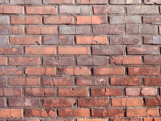 brick texture. An old brick wall. Background. A day in the city.