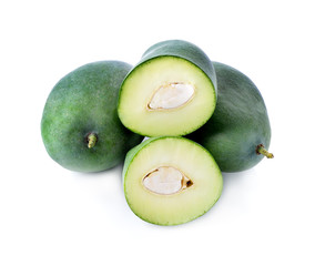 Green mangoes slices isolated on white background