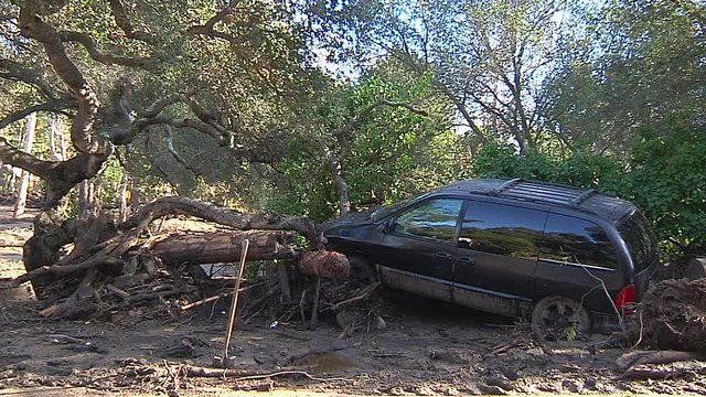 2018 - fire crews inspect damage from the mudslides in Montecito, California following the Thomas fire disaster.