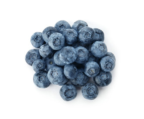 Heap of fresh ripe blueberries on white background