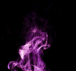 Purple smoke on black background