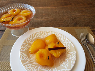 Sweet pear in syrup with cinnamon and cloves