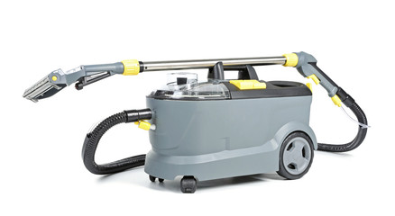 Modern professional carpet cleaner on white background