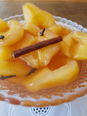 Sweet pear in syrup with cinnamon and cloves