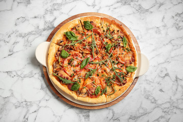 Tasty homemade pizza on table, top view