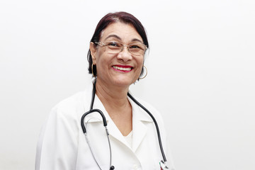 Portrait of senior Brazilian woman doctor with stethoscope