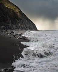 Hiker on the Lost Coast Trail, racing the tide.