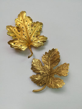A Set Of Gold Leaf Brooch
