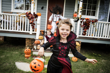 Little children trick or treating