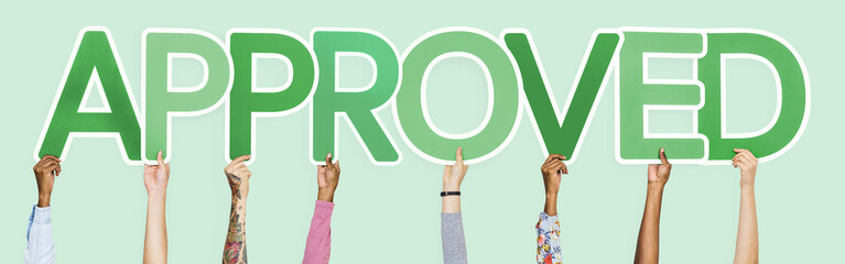 Green letters forming the word approved