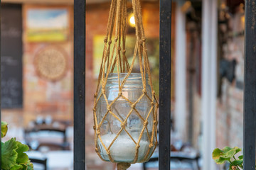 View of a beautiful ornamental jar hanged on a window in Venice Italy 