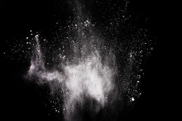 White powder explosion on white background. Colored cloud. Colorful dust explode. Paint Holi.