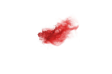 Freeze motion of red powder exploding, isolated on white background. Abstract design of red dust cloud. Particles explosion screen saver, wallpaper