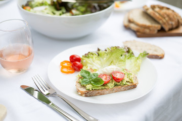 avocado toast, salad and bread