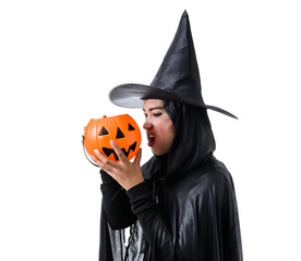 Portrait of woman in black Scary witch halloween costume standing with hat isolated on white background