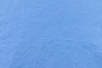 Obraz premium Blue wrinkled paper