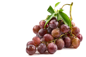 Fresh grapes with  leaves isolated on white background